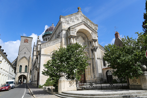 Tours, France - August 14, 2014: Unidentified people at the Basilique Saint Martin and Tours Charlemagne in the old center of Tours, France.