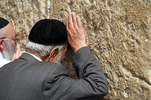 Israel, Jerusalem, Decemcer 26, 2022: Jewish man praying at the Western wall in Jerusalem