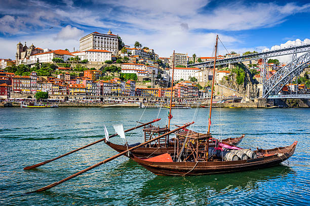 Porto, Portugal Cityscape Porto, Portugal cityscape on the Douro River. rabelo boat stock pictures, royalty-free photos & images