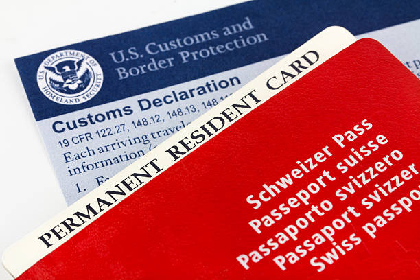 istock Swiss passport, resident card and customs form 527398567