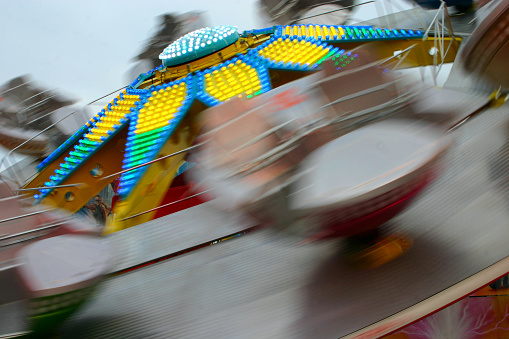 High speed carousel at the carnival fair