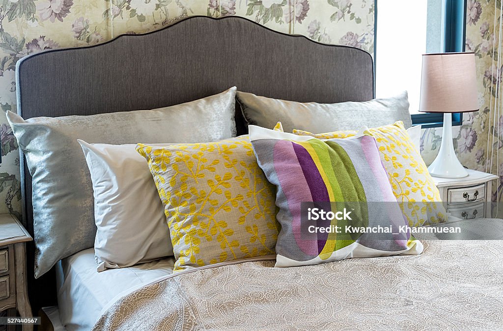 Colorful pillow on bed Apartment Stock Photo