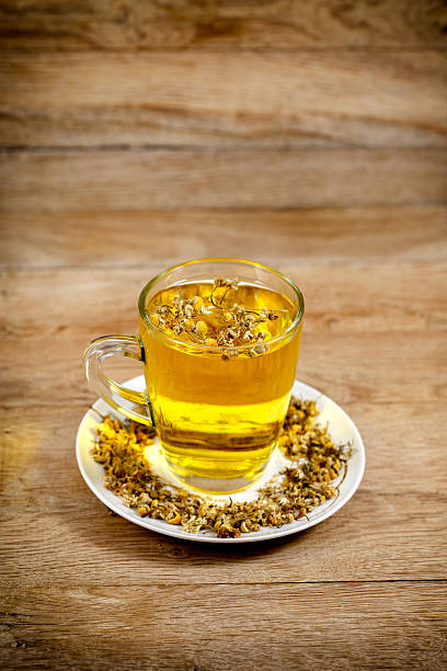 istock Glass of chamomile - camomile tea 527442339
