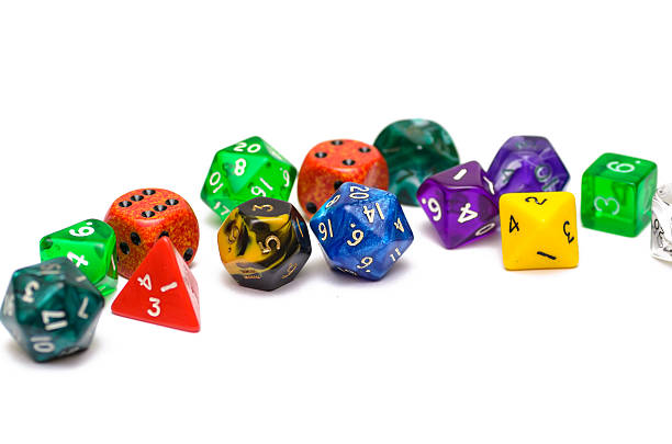 istock multiple colorful role playing dices lying on isolated backgroun 527443103