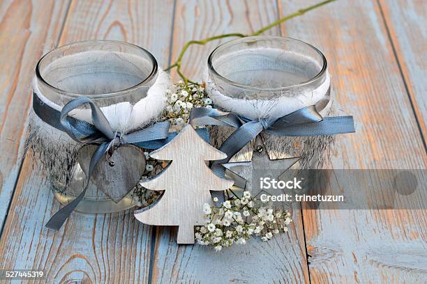 White Grey Christmas Decoration On Old Wood With Flowers Stock Photo - Download Image Now