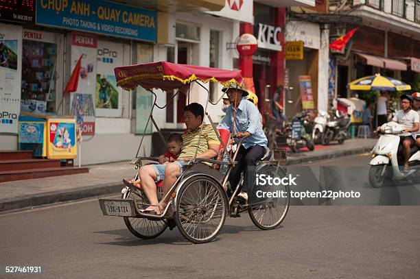 People In The Area Taking A Cyclo Ride In Hanoi Vietnam Stock Photo - Download Image Now