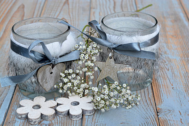 istock White grey Christmas decoration on old wood with  flowers 527465757