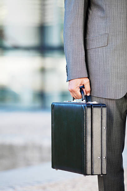 istock Businessman Holding a Briefcase Outdoors 527465799