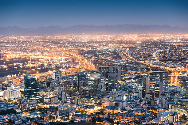 Aerial view of Cape Town from Signal Hill after sunset Aerial view of Cape Town from Signal Hill after sunset during the blue hour - South Africa modern city with spectacular nightscape panorama signal hill stock pictures, royalty-free photos & images