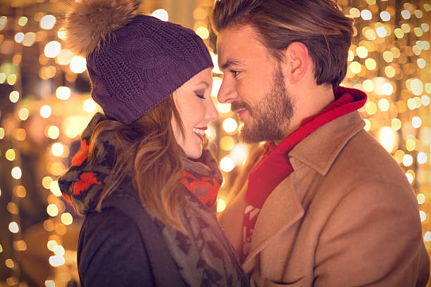 istock Couple outdoors in winter city. 527466967