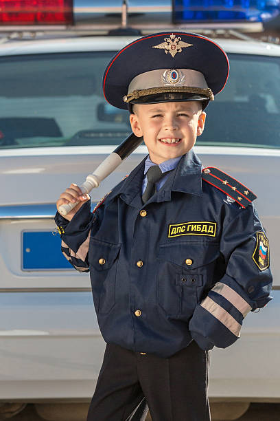 istock Happy little police officer 527467049