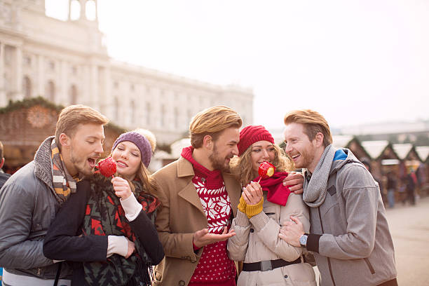 istock Friends having fun outdoors in winter city. 527468471