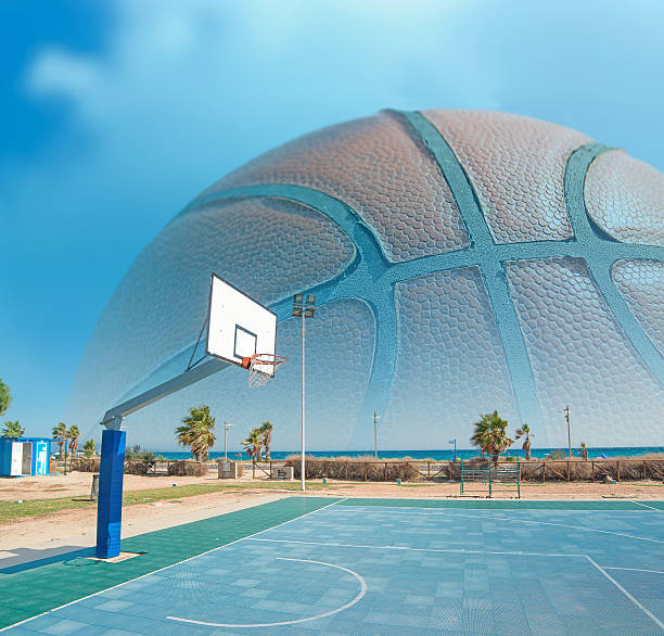 hoop with a huge basketball in the background