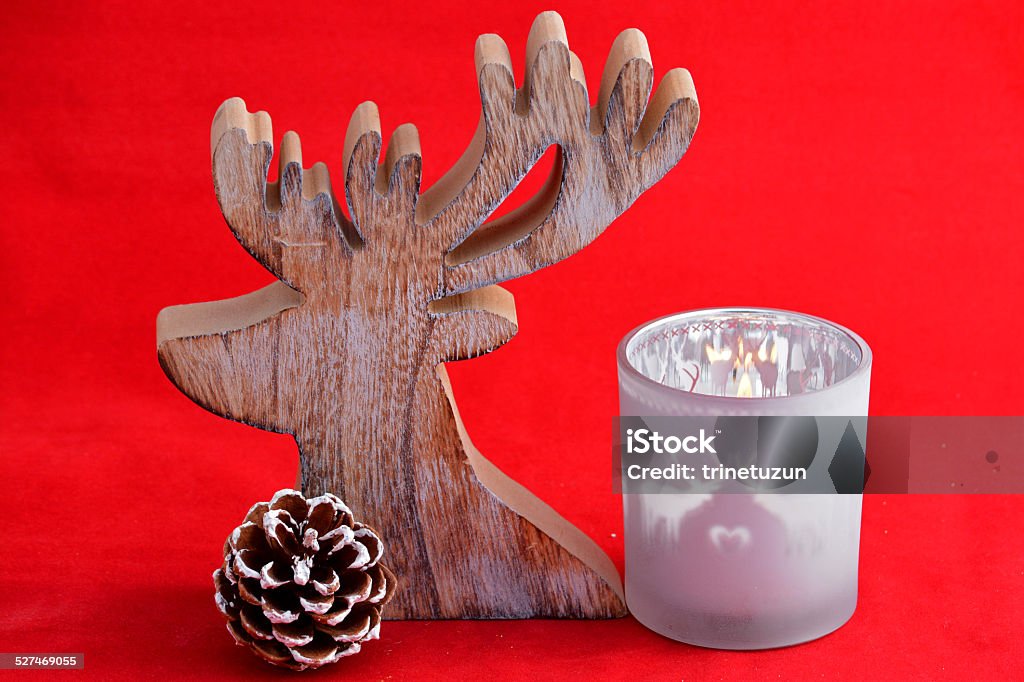 Red white Christmas decoration with tea lights candles and reindeer Candle Stock Photo