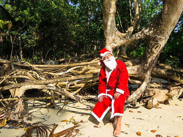 istock Santa Cloaus  resting on beach 527477193
