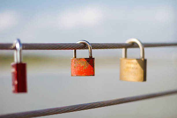 Locks of love on the bridge Locks of love on the bridge selective focus on a lock. shallow dof Slective Focus stock pictures, royalty-free photos & images