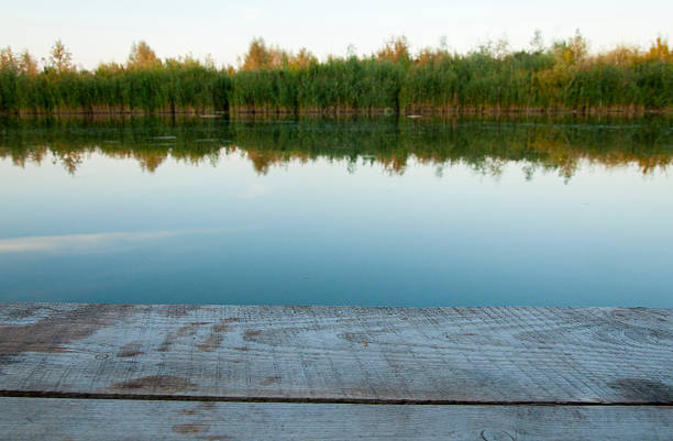 istock river pier in a landscape sunset 527480759
