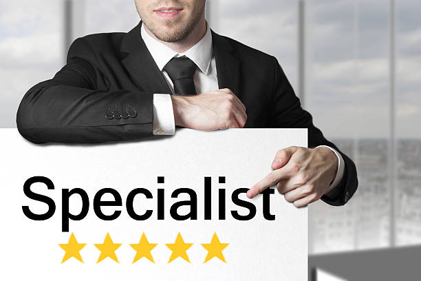 istock businessman pointing on sign specialist five stars 527483761
