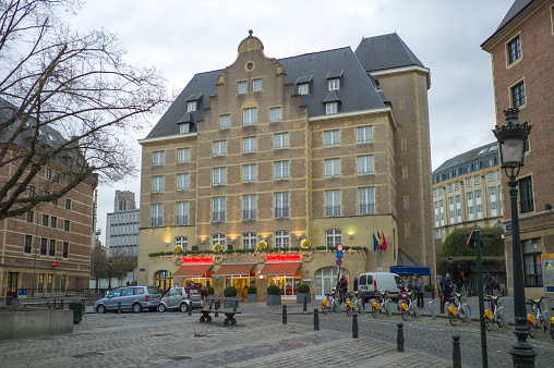 brussel, belgium - December 5, 2013: People are visiting town squares with old buildings at brussel belgium