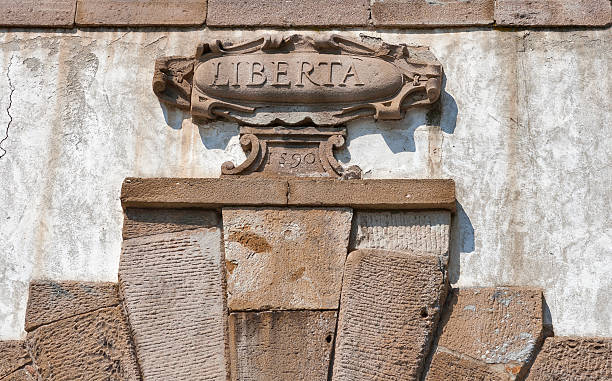 istock inscription freedom on the bas-relief of a dilapidated ancient b 527491419