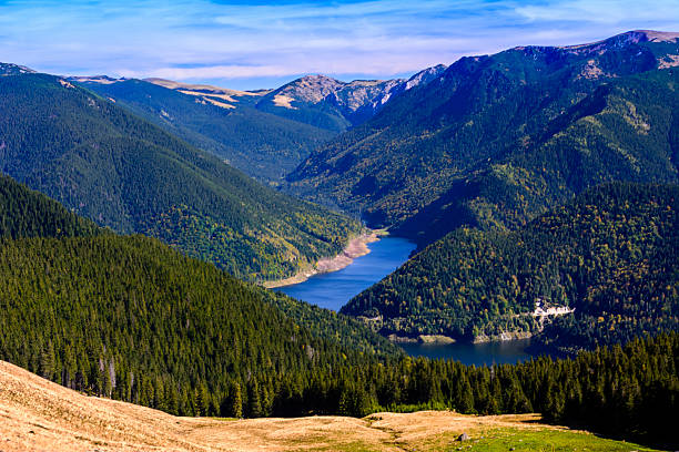 istock The lake among mountains 527493741
