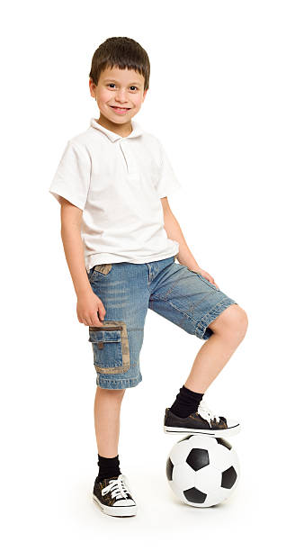 istock boy with soccer ball 527495003