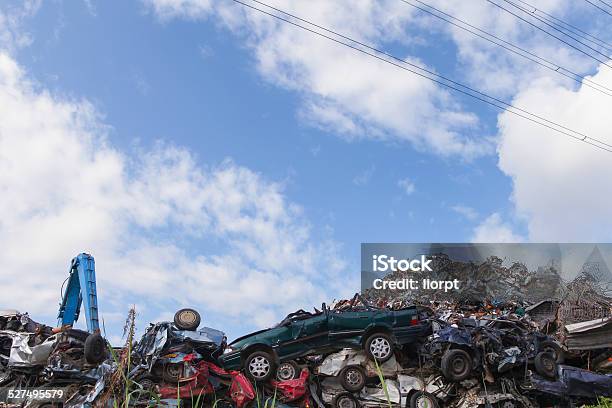 Scrap Yard With Crushed Cars And Blue Sky Stock Photo - Download Image Now - Scrap Metal, Accidents and Disasters, Blue