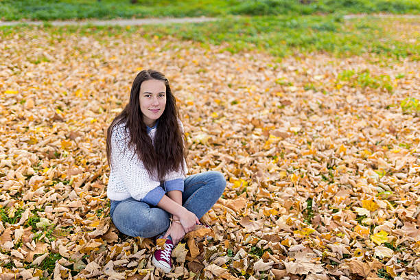 istock Woman portret in autumn leaf 527510711
