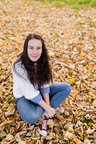 istock Woman portret in autumn leaf 527510719