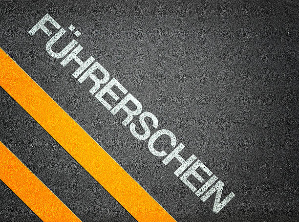 German FÃ¼hrerschein driving license Text Writing Road Asphalt German FÃ¼hrerschein driving license Text Writing Road Asphalt Word Floor Ground fã stock pictures, royalty-free photos & images