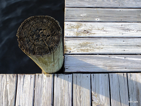 detail of dock, boat dock, pier, simple design, contrast, black and whit