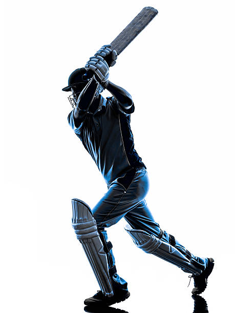 Cricket player batsman silhouette Cricket player batsman in silhouette shadow on white background batsman stock pictures, royalty-free photos & images