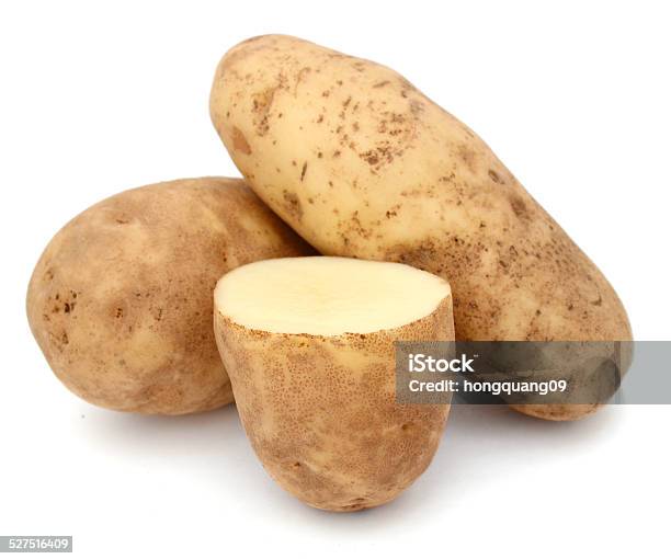 Cutting And Whole Potatoes Isolated Stock Photo - Download Image Now - Russet Potato, Cutting, Bright