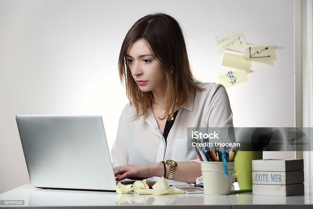 Young woman working with computer Young woman working with computer - education or business concept 20-29 Years Stock Photo