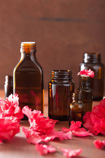 istock essential oil azalea flowers on dark rustic background 527517935