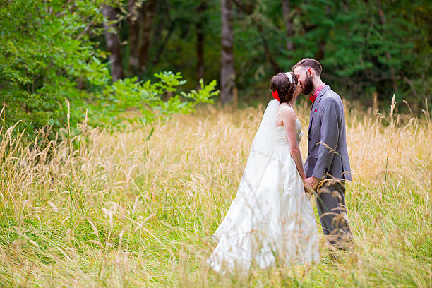 istock Bride and Groom in Field 527518539