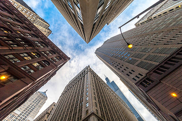 Downtown Chicago Downtown Chicago. Business buildings on the sides. aon center chicago photos stock pictures, royalty-free photos & images