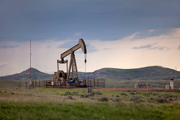 istock South Dakota stormy prairie oil pump jack flare stack pollution 527527470