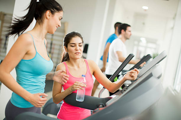 istock Young people training in the gym 527528734