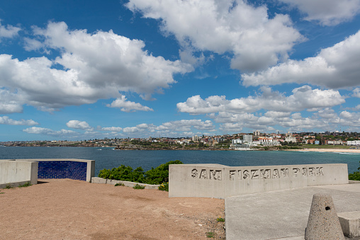 Sydney, Australia - November 9, 2015: View of Bondi and Tamarama from Sam Fiszman Park on a sunny day, Sydney's famous Bondi Beach is on the right.