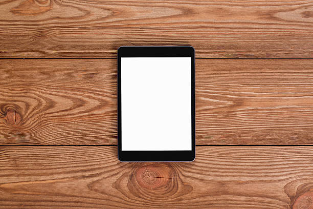 istock Top of desk with digital tablet. 527529360