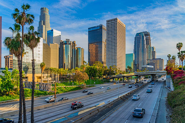 istock Skyscrapers of Los Angeles skyline with freeway,CA (P) 527529782
