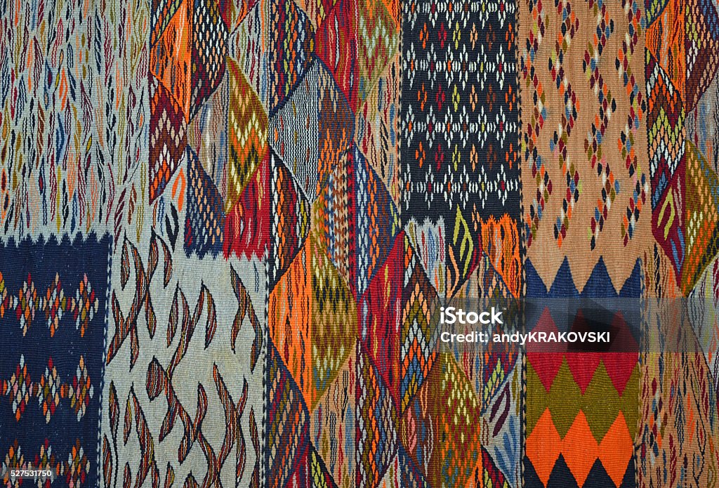 Berber motif, Morocco Typical Berber motifs showing lack of symmetry, seen on a rug in the High Atlas mountains of Morocco. Designs and skills are passed down through generations of Berber women. Africa Stock Photo