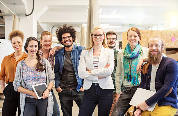 Confident business team smiling in office