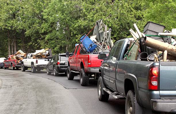 Long Line Up Of Trucks Heading For The City Dump stock photo