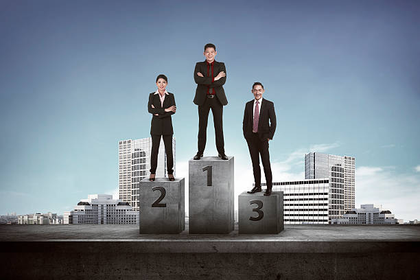 istock Asian business people standing on the podium 527539514