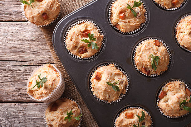 istock muffins with ham and cheese close up in baking dish 527540836