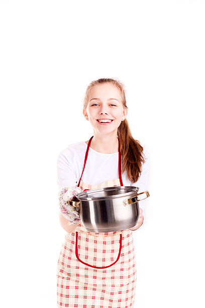 istock Woman with apron and pan isolated 527543158