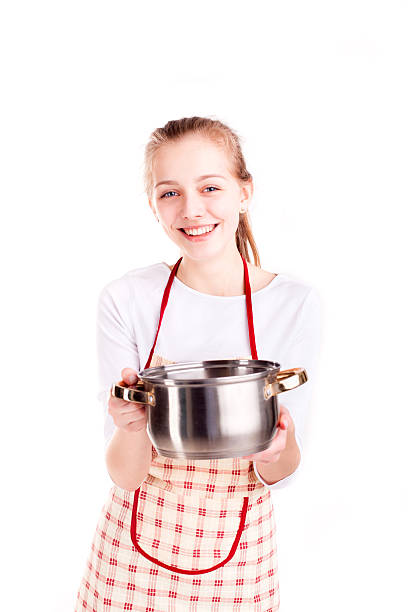 istock Pretty girl cook soup isolated 527543222