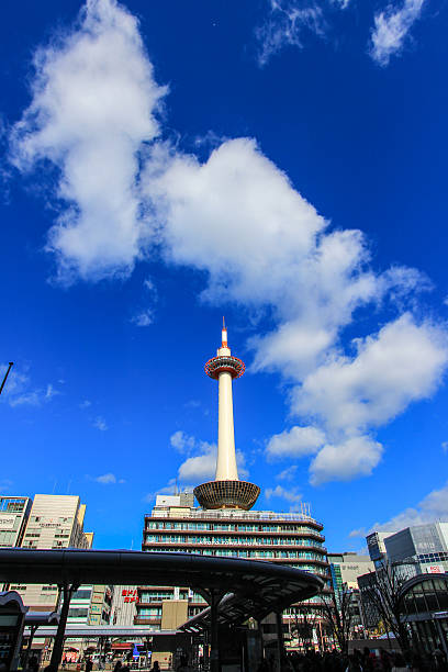 istock Kyoto Tower with clear blue sky background 527543392